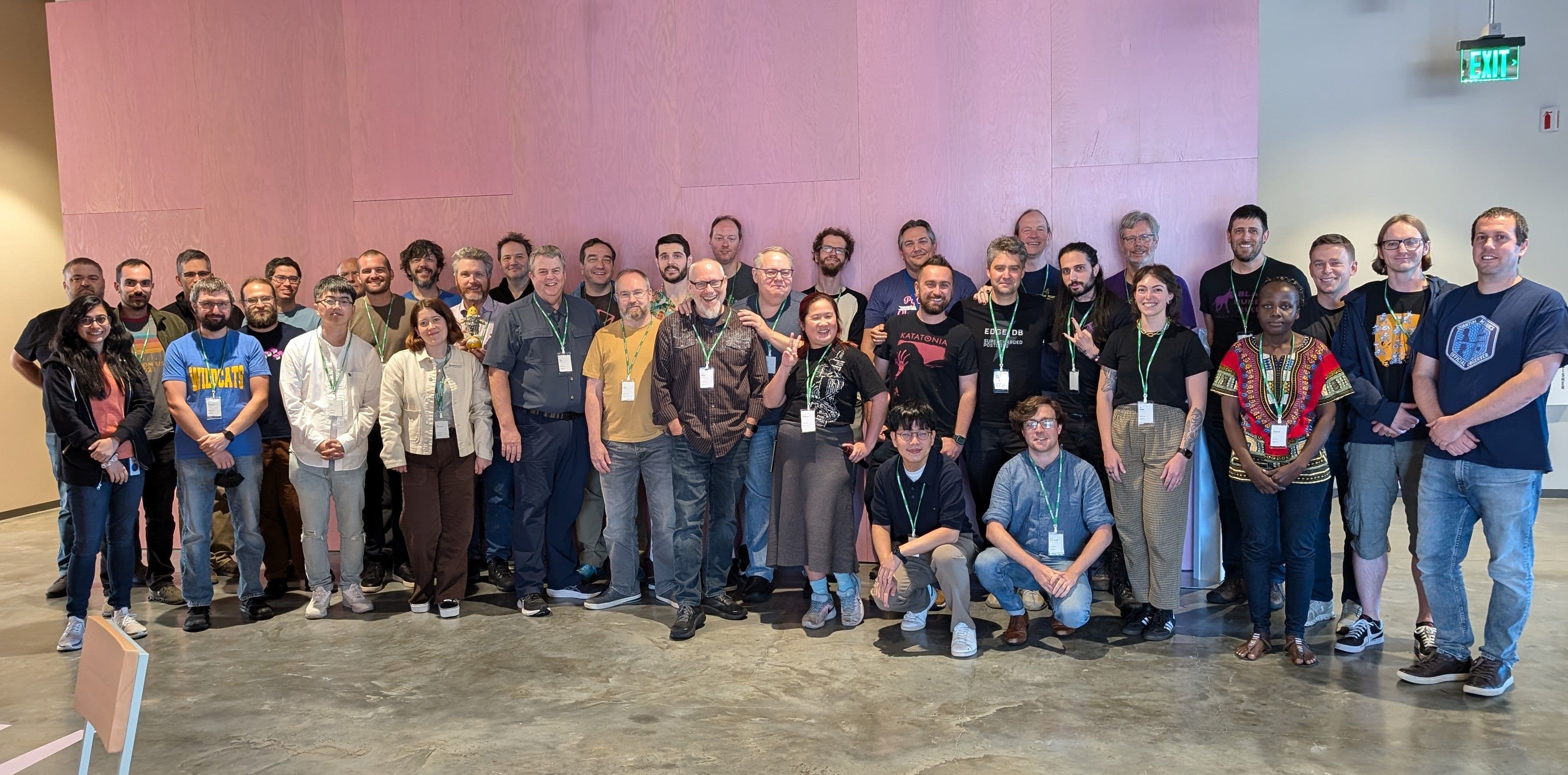 A large group of people smiling for the camera.